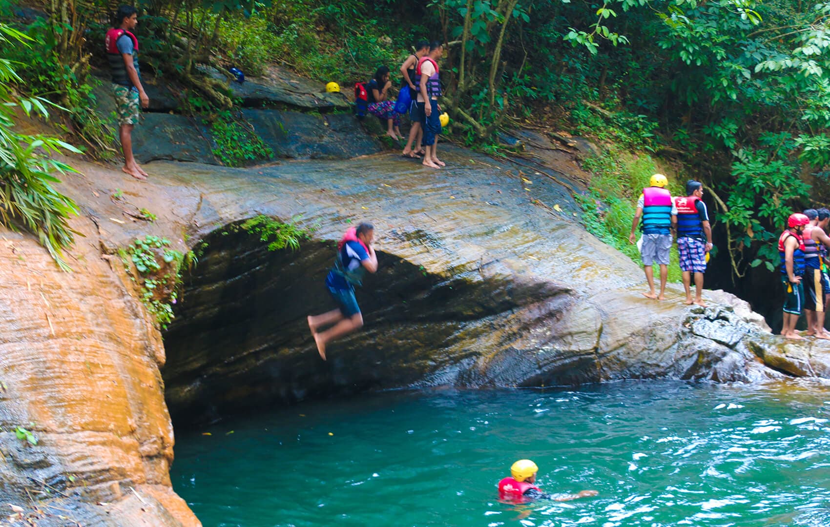Abseiling down a rainforest waterfall at Kitulgala